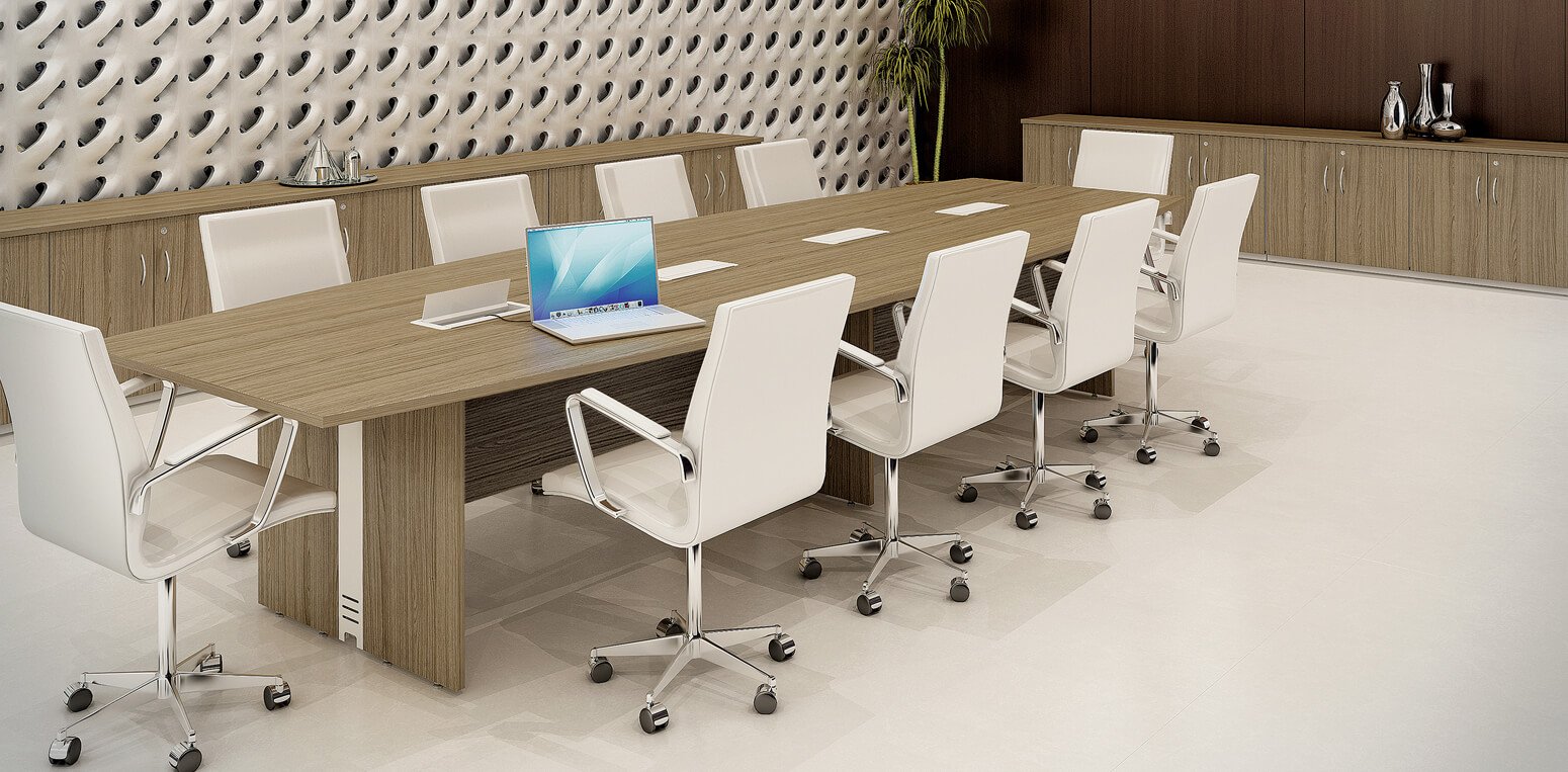 Mesa de reunião com pé em madeira, calha para passagem de fiação e tampo semioval. Várias medidas e cores.